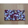 Pochette à masques fleurie rouge