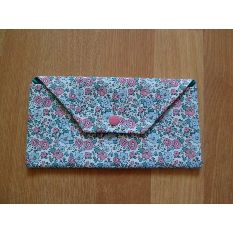 Pochette à masques fleurs roses